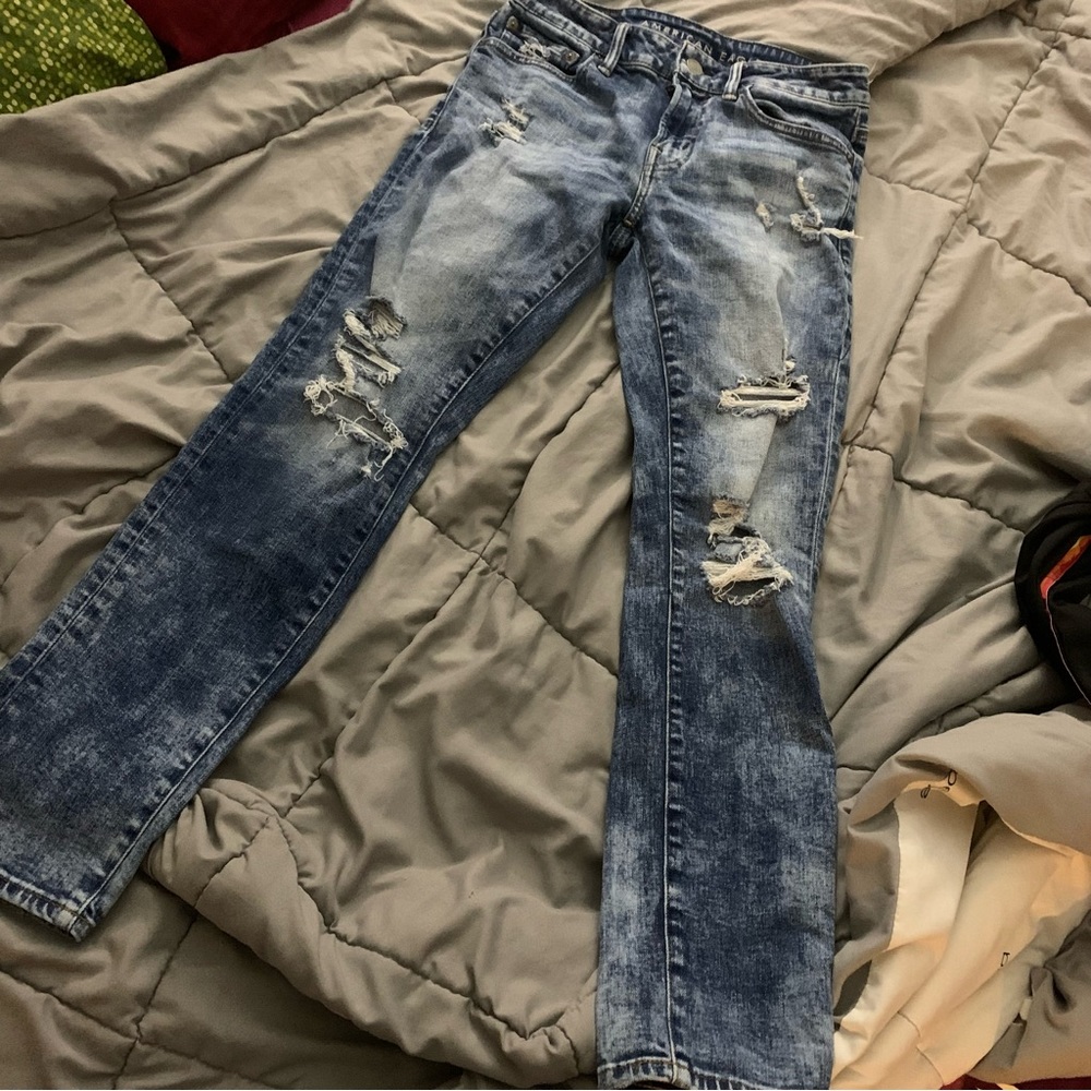 Light washed distressed American eagle mens skinny jeans